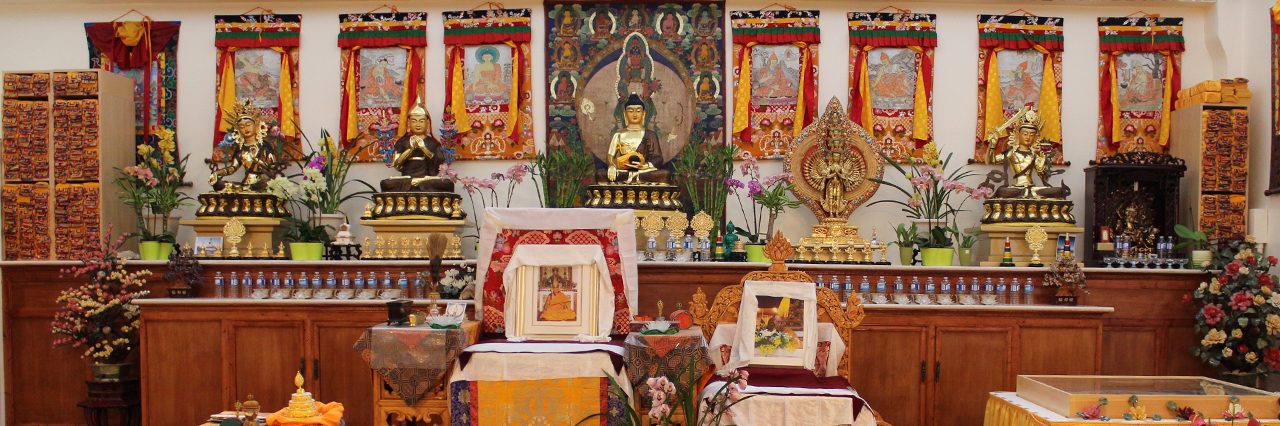 The main altar at Land of Compassion Buddha Edmonton, with Shakyamuni Buddha and surrounding bodhisattvas